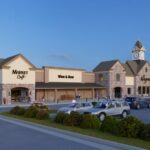 Wegmans Store in Pittsburgh Region with a clock tower and cars parked in front of it