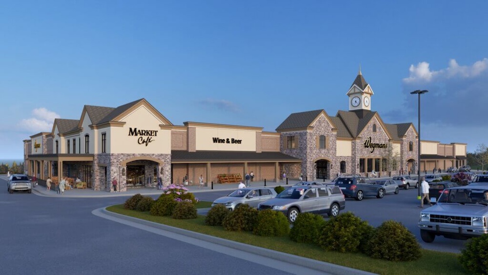 Wegmans Store in Pittsburgh Region with a clock tower and cars parked in front of it